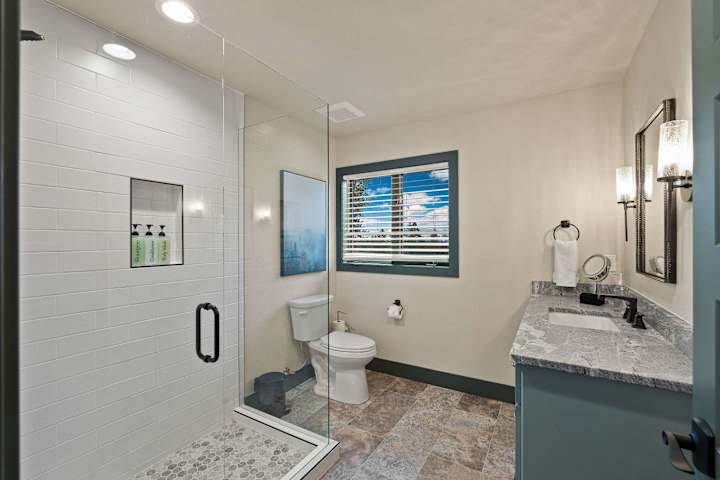 Bathroom with shower and double vanity