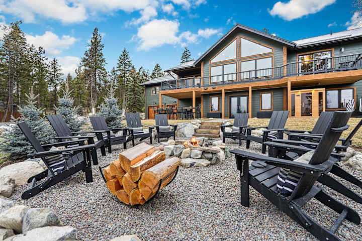 Fire pit seating with the lodge exterior beyond