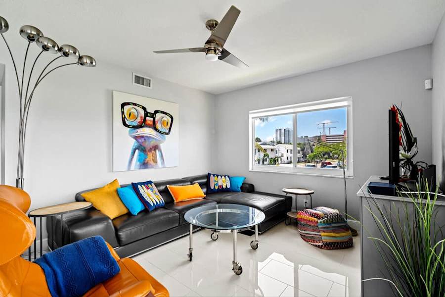 Pompano Condo: Pops of color give the space a fun and playful vibe