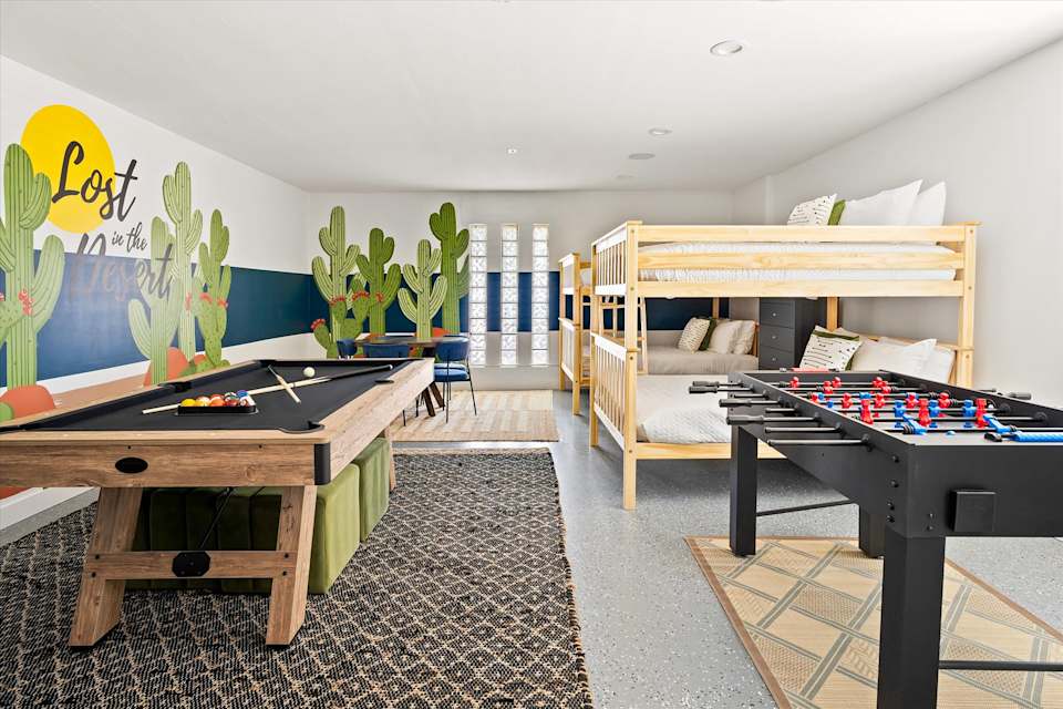 Game room with pool table, foosball and bunk beds