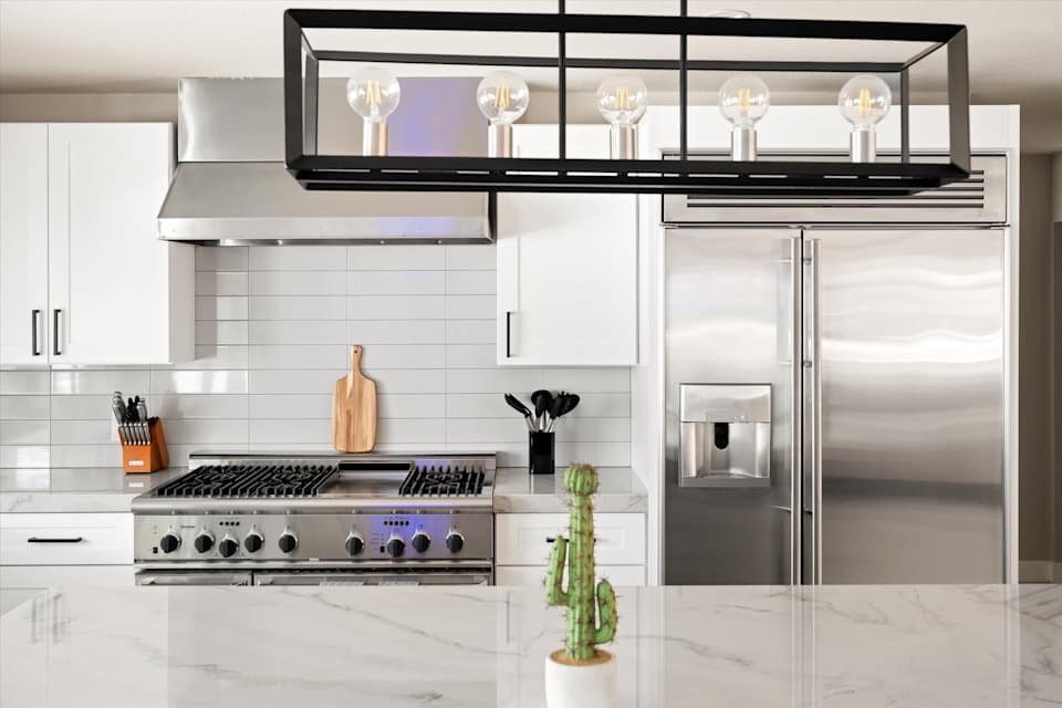 Kitchen range, vent hood and preparation counters