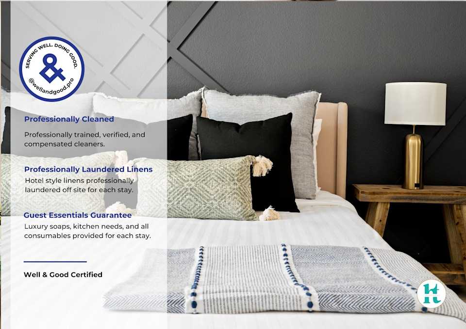 Bedroom with upholstered bed and coordinated bedside lamps