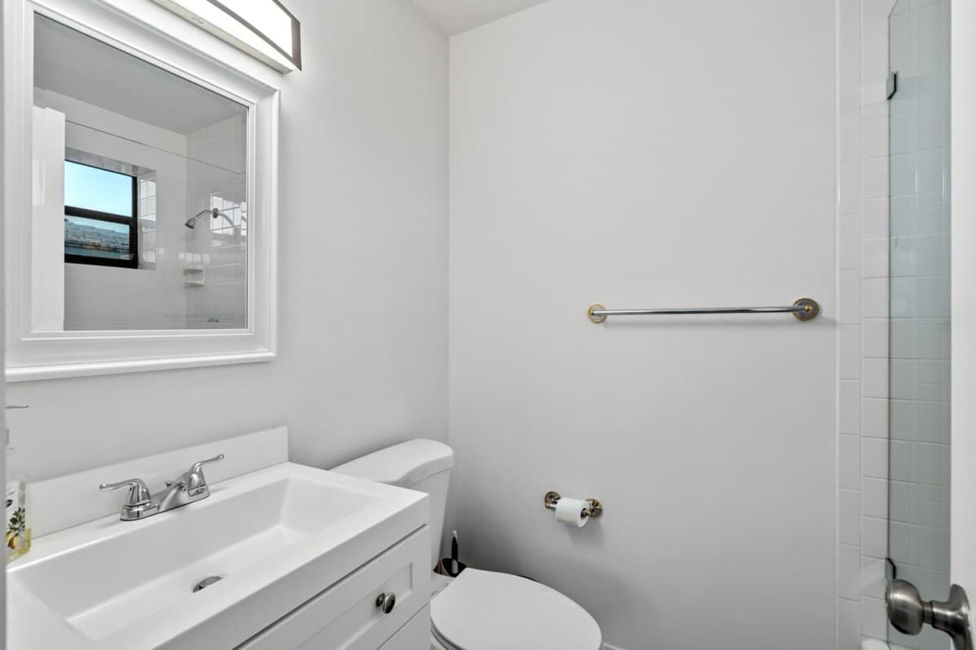 Gardens By The Sea: Bathroom with vanity, mirror and walk in shower