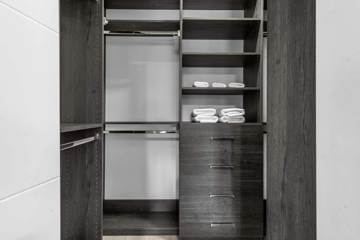 The Arcade House: Fitted wardrobe with hanging rails, shelves and drawers