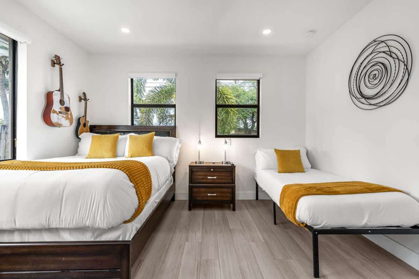 The Arcade House: Bedroom with king bed and a single bed, sleeping three