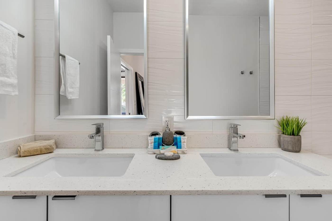 The Arcade House: Double vanity with twin mirrored cabinets