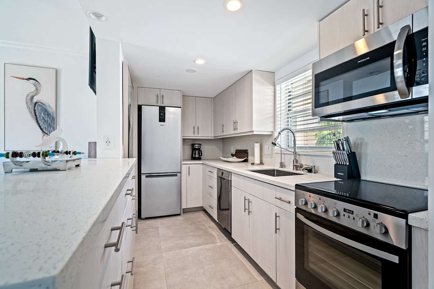 Ocean Block: Our modern kitchen is fitted with stainless steel appliances