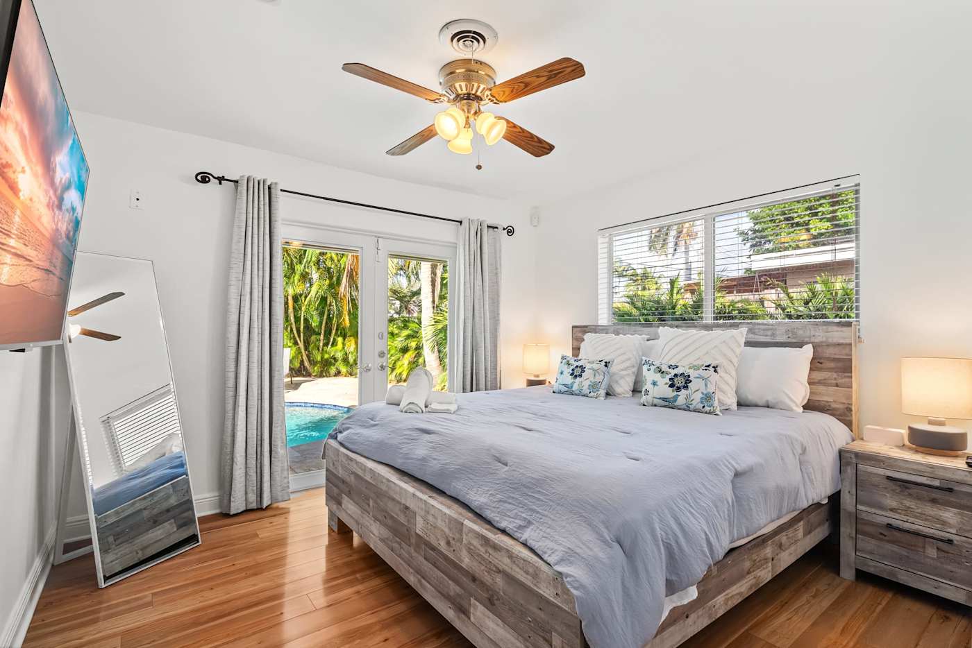 Cypress Cove: This bedroom has a king-size bed and direct access to the pool area