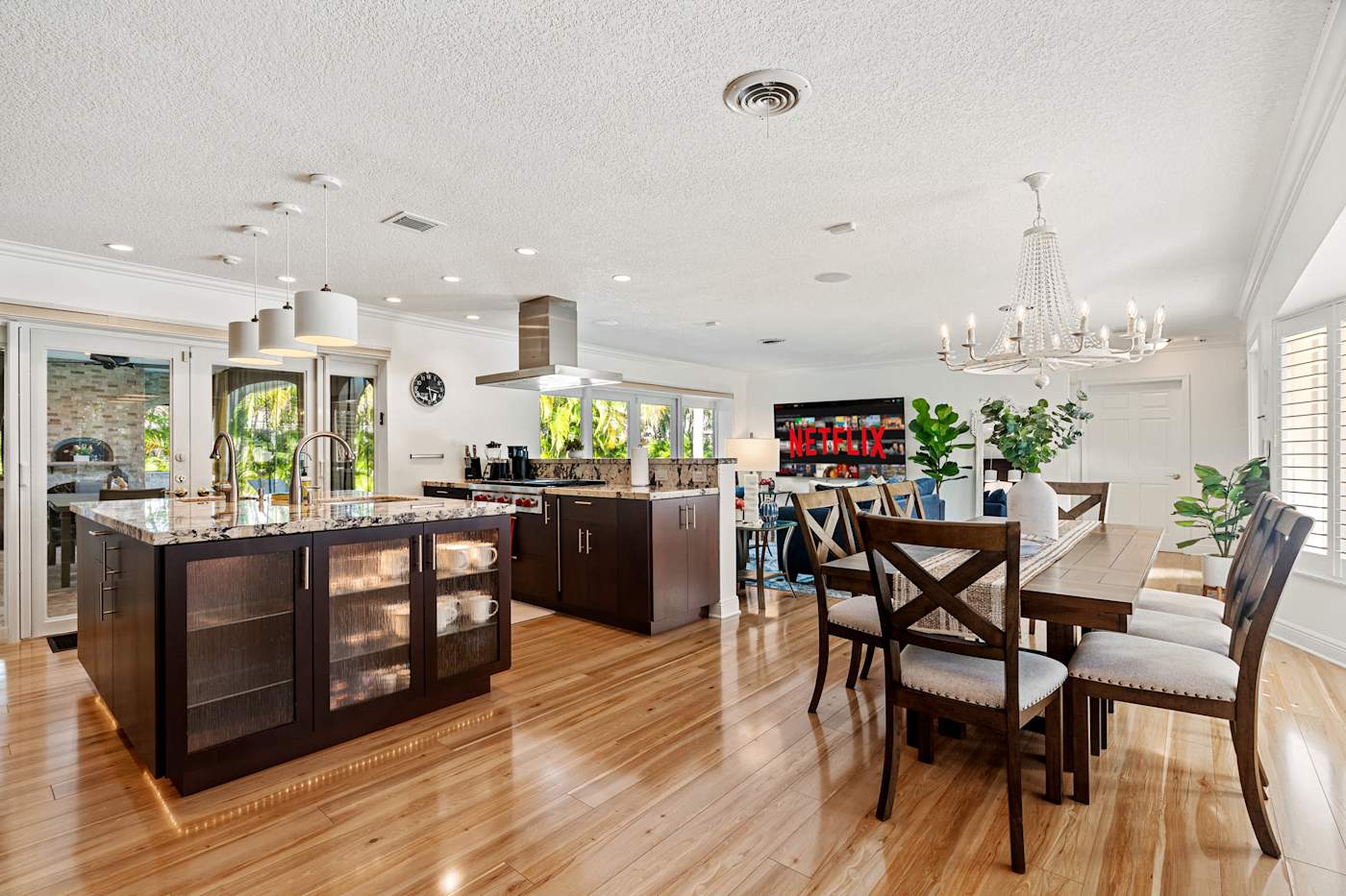 Cypress Cove: The kitchen island and dining table share one open space