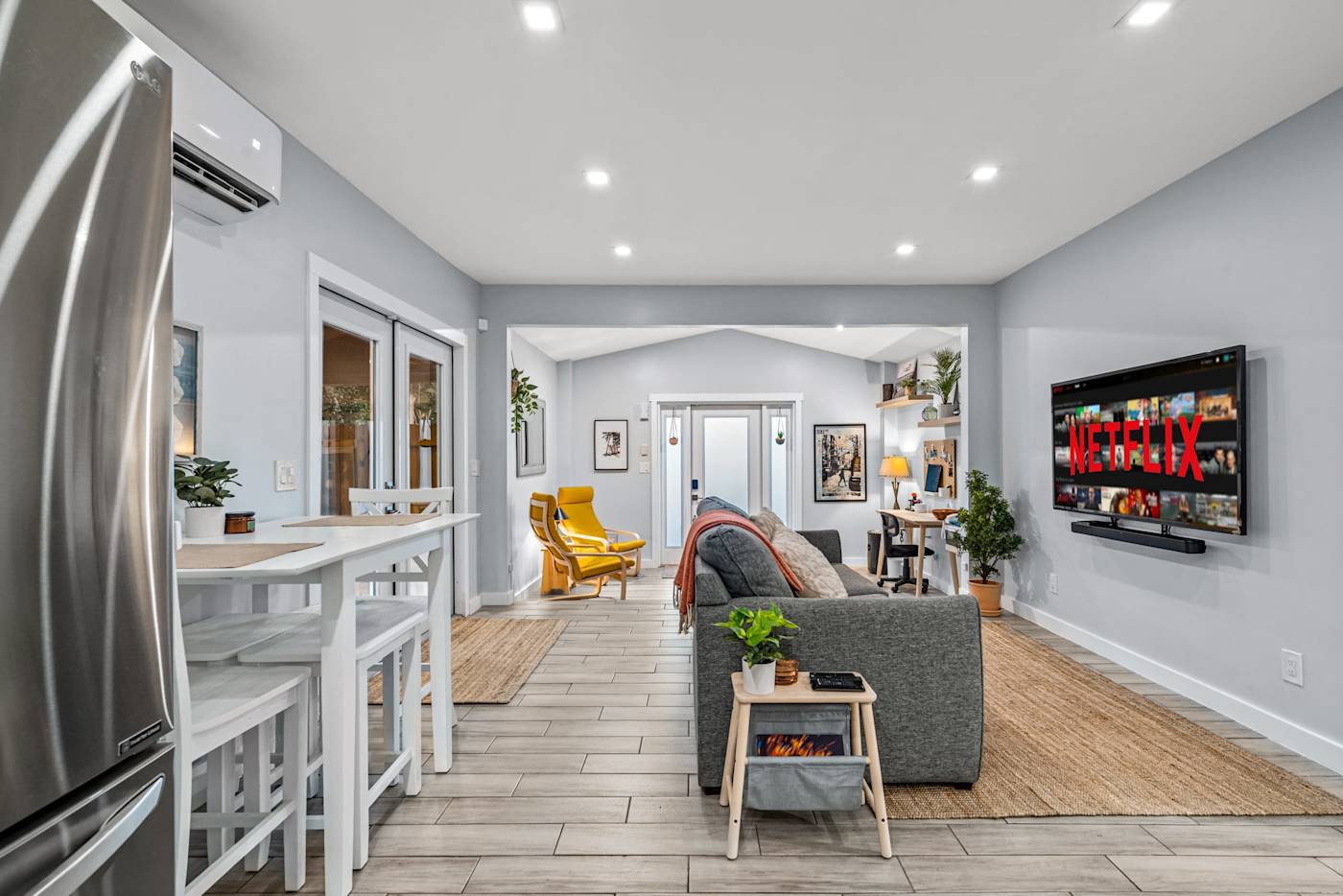EV Retreat: The open living area runs from the kitchen bar to a reading corner