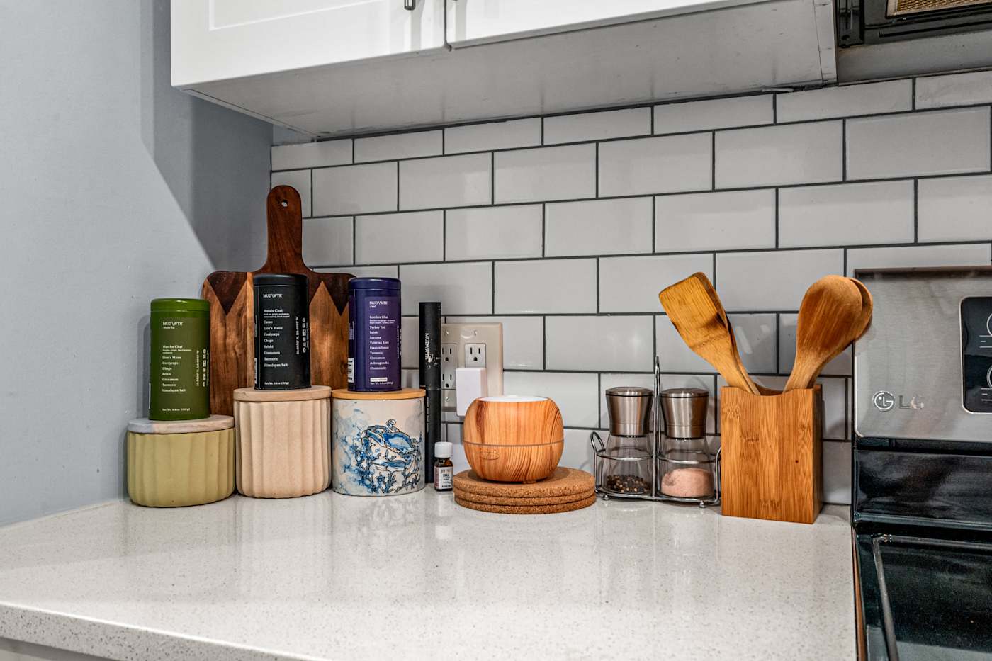 EV Retreat: The kitchen counter is stocked with coffee canisters and wood utensils