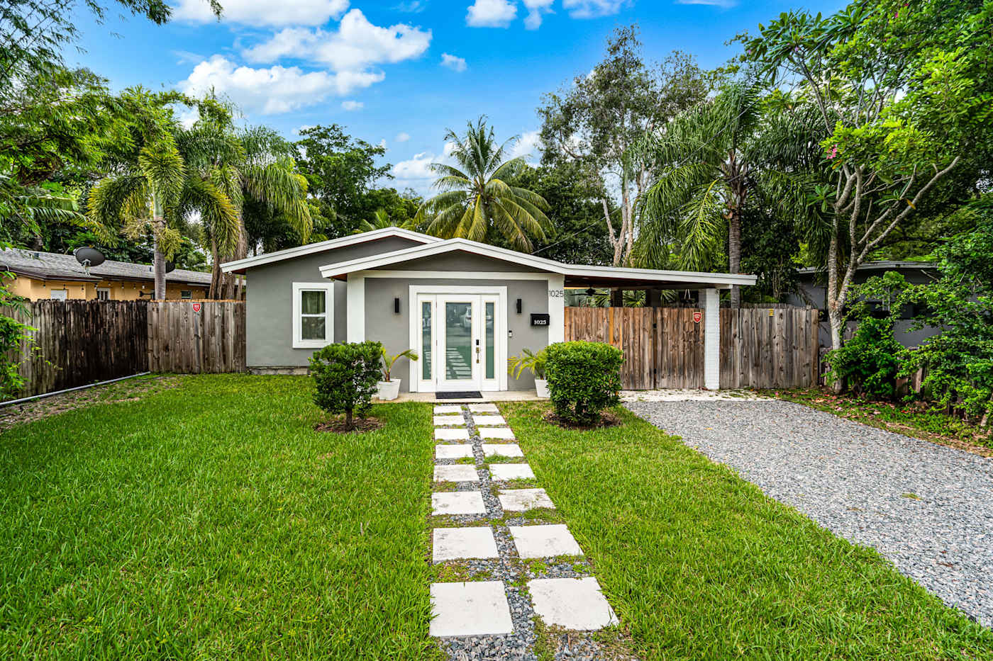 EV Retreat: A stone path leads across the front lawn to the entrance