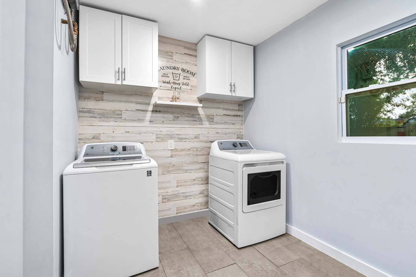 EV Retreat: The laundry room with a washer and dryer