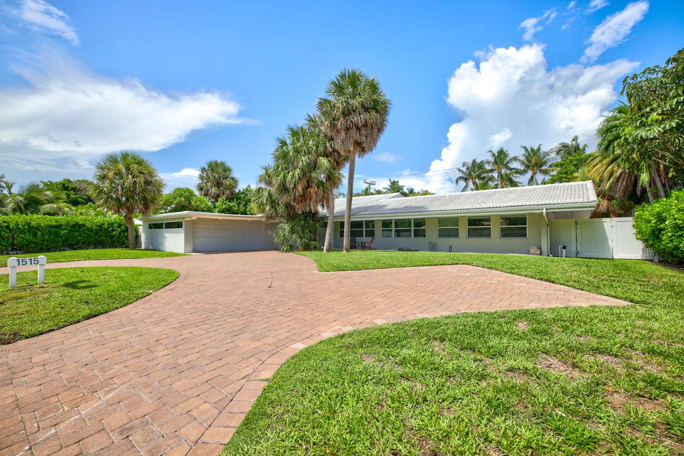 6 Bed Beach House: Paver driveway with parking for several cars