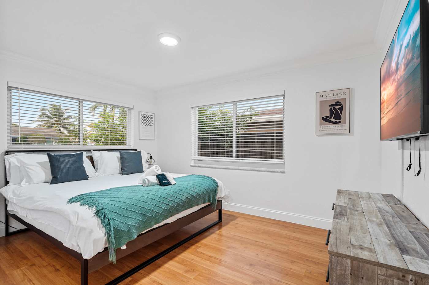 The Game House: Bedroom with king bed, smart TV and dresser