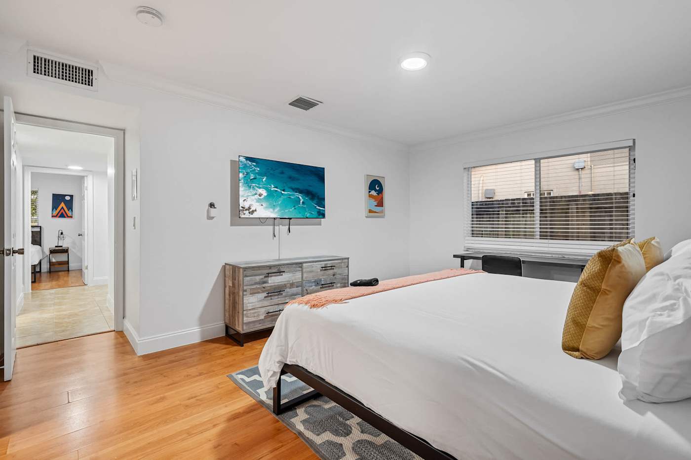 The Game House: Bedroom with king bed, smart TV and dresser
