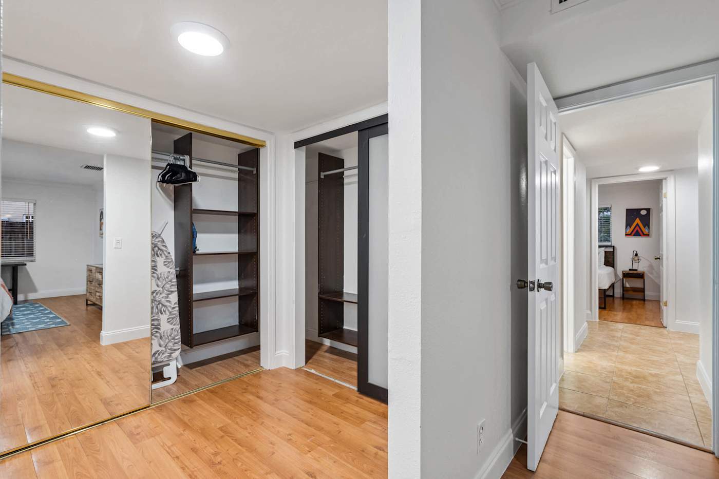 The Game House: Hallway with fitted wardrobe and mirrored doors