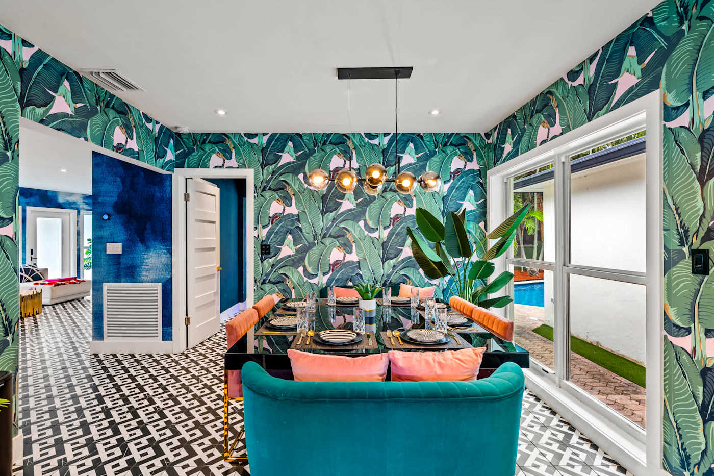 Beach Pop House: Dining room seating six, with banana leaf wallpaper