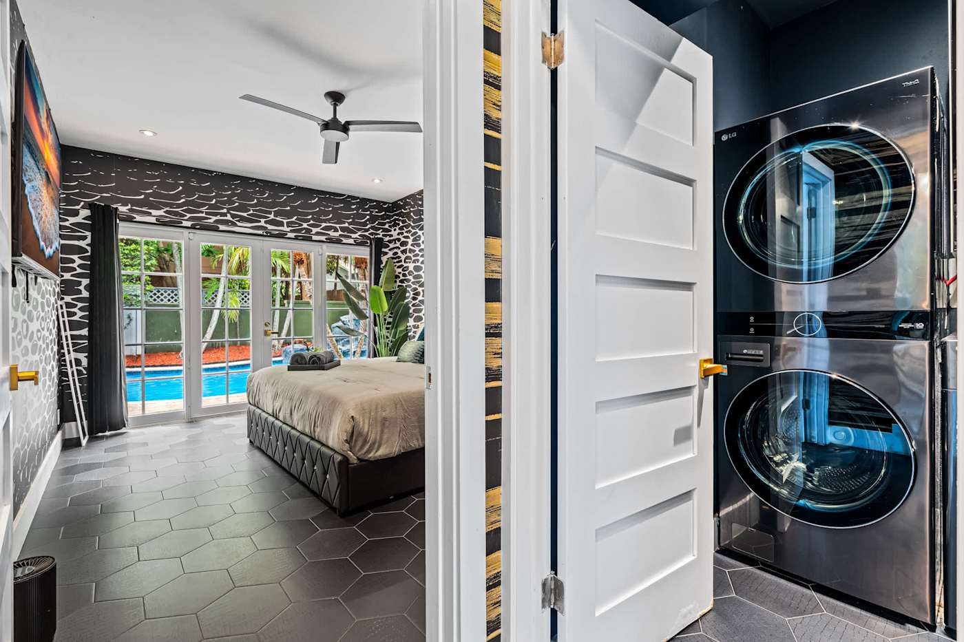Beach Pop House: Bedroom doorway, with the laundry alongside