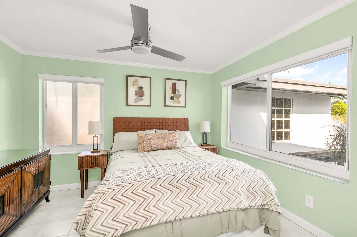 The Fairway: Bedroom with queen bed, bedside lamps and a dresser