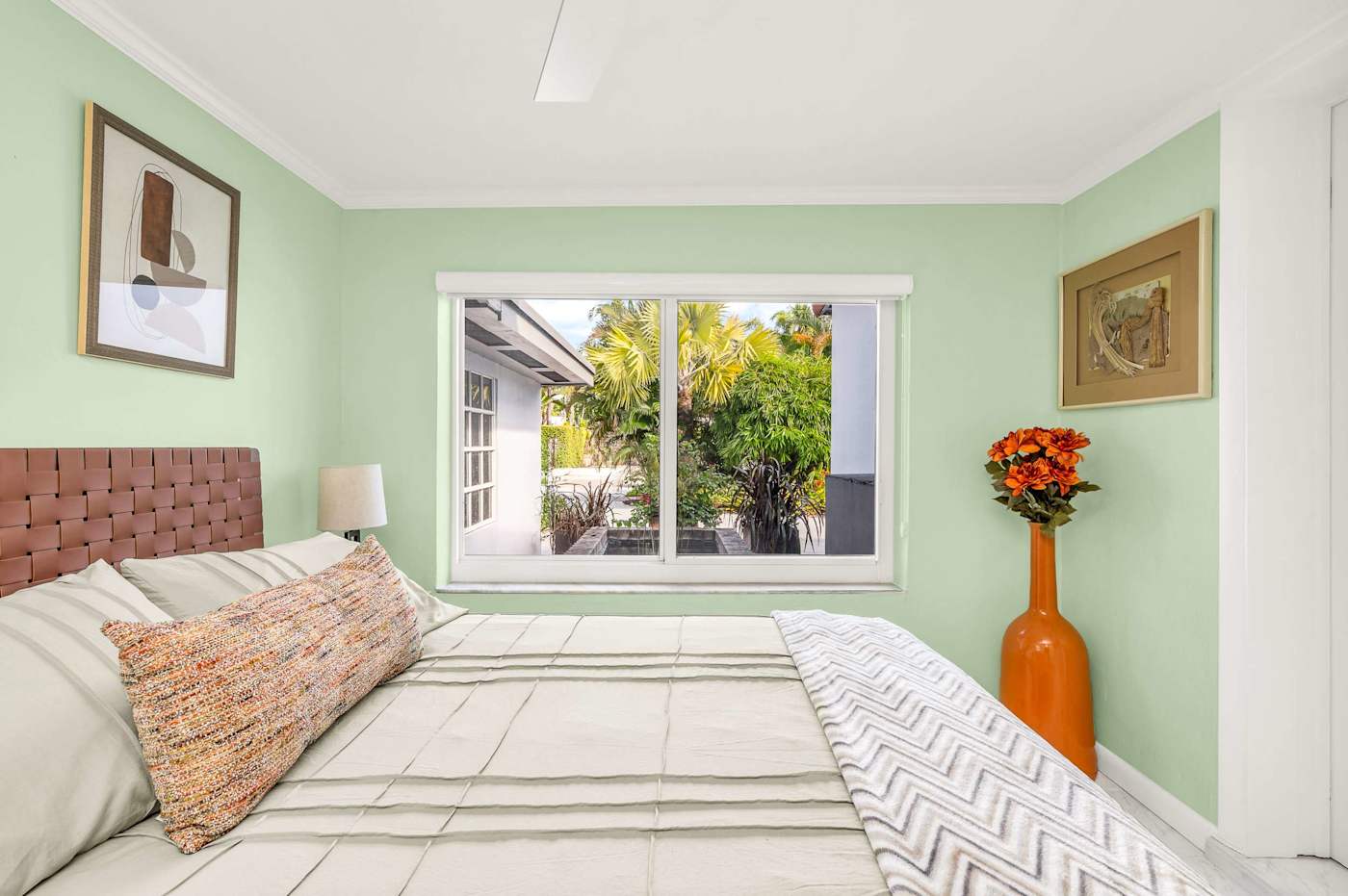 The Fairway: Bedroom with queen bed and views over the garden