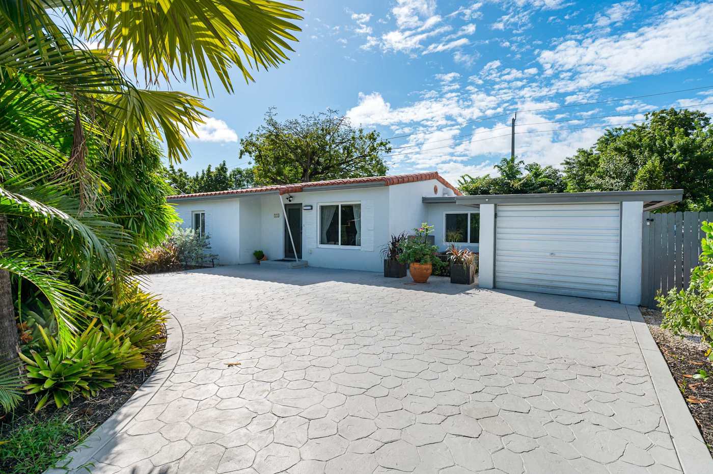 The Fairway: The house and garage from the paved drive