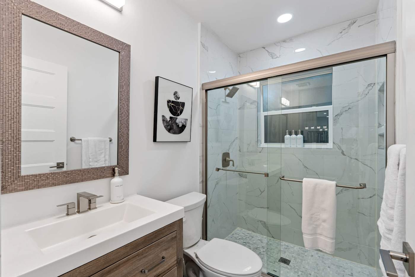 Casa Pura Vida: Bathroom with walk in glass shower and stone vanity