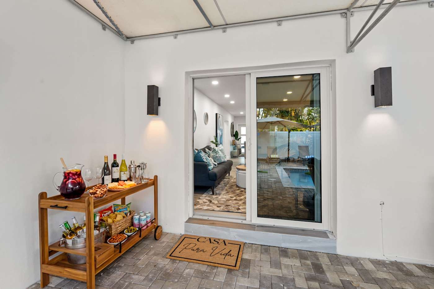 Casa Pura Vida: Drinks trolley by the doors out to the pool