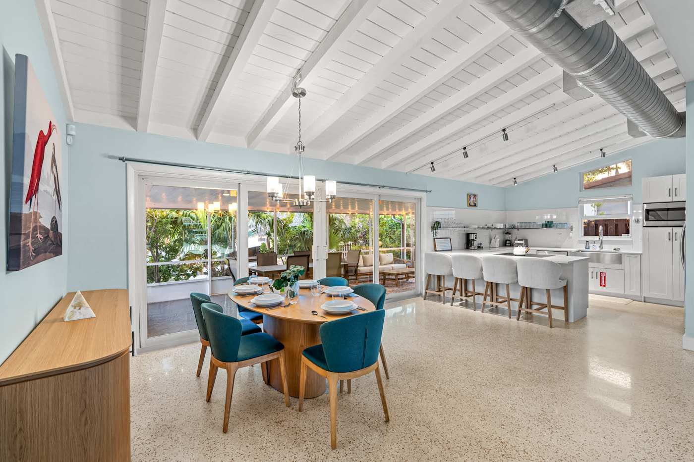 Canal House: Dining table for six, open to the kitchen