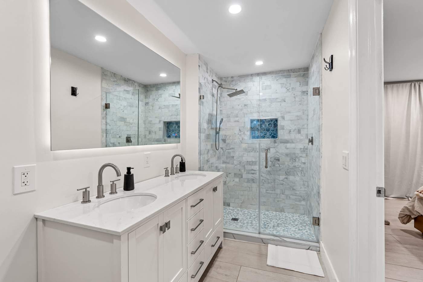 Canal House: Bathroom with double vanity, mirror and marble shower