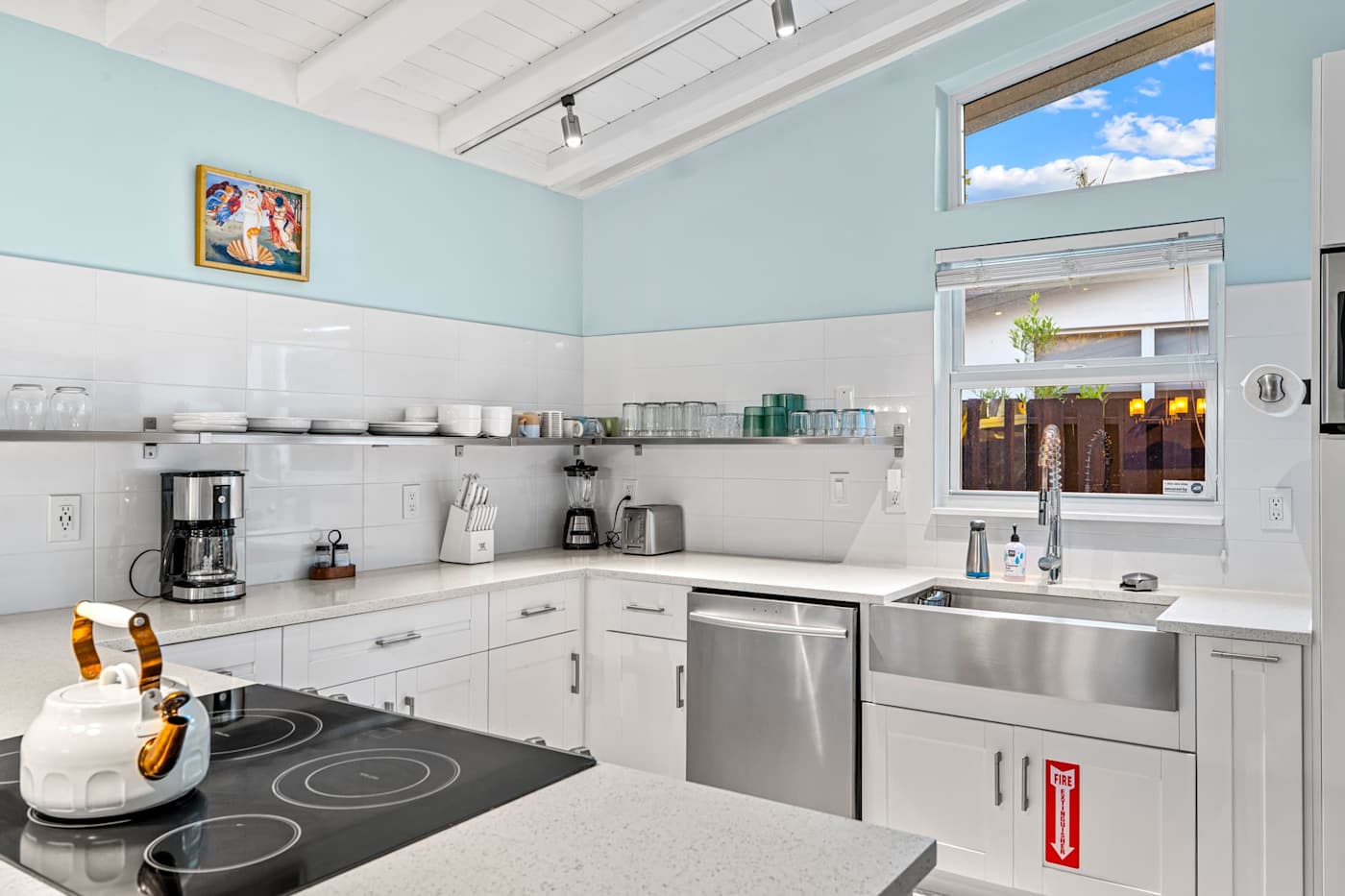 Canal House: Kitchen with electric hob, dishwasher and farmhouse sink