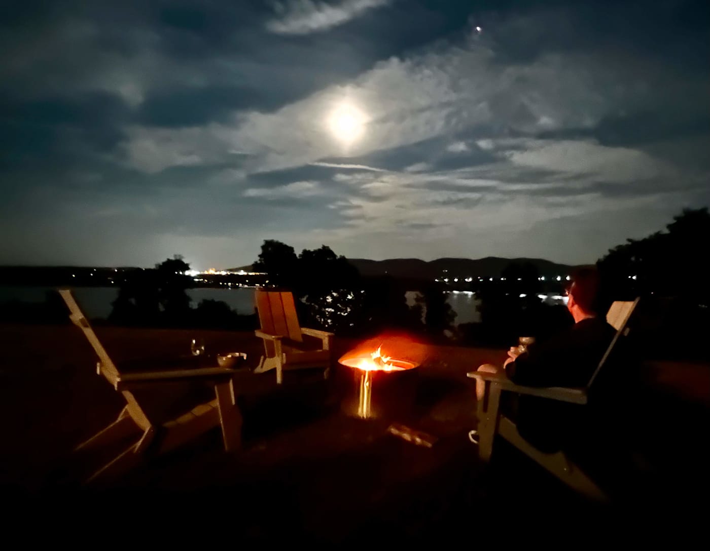 Hudson House: Fire pit at night under a full moon