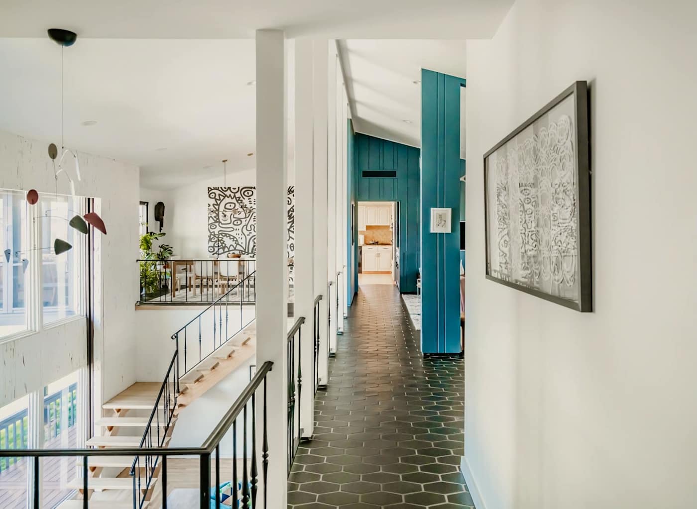 Hudson House: Upstairs hallway overlooking the living room and staircase