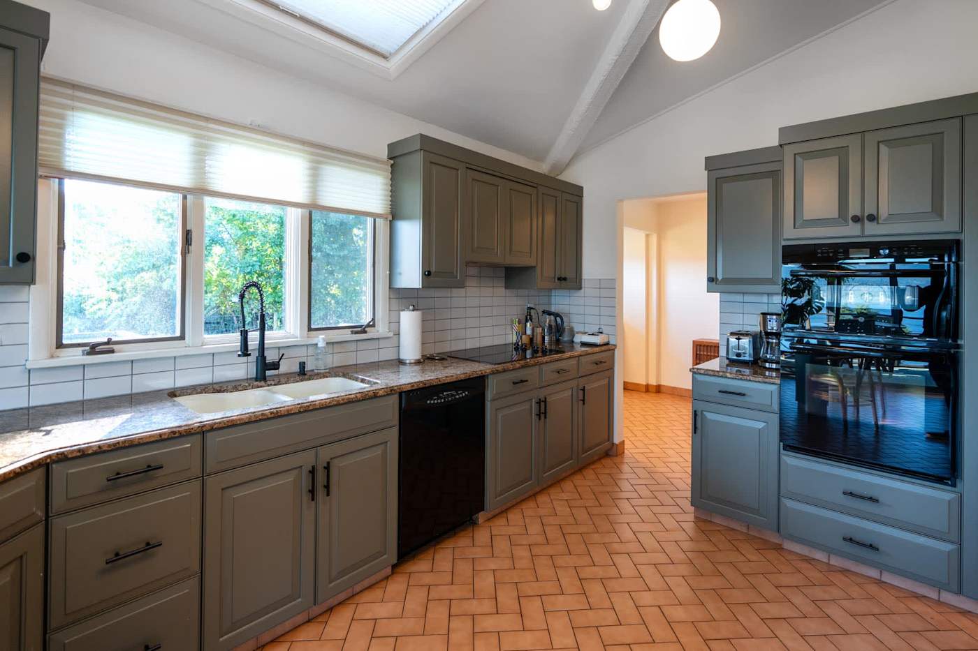 Hudson House: Kitchen with double wall oven, dishwasher and garden windows