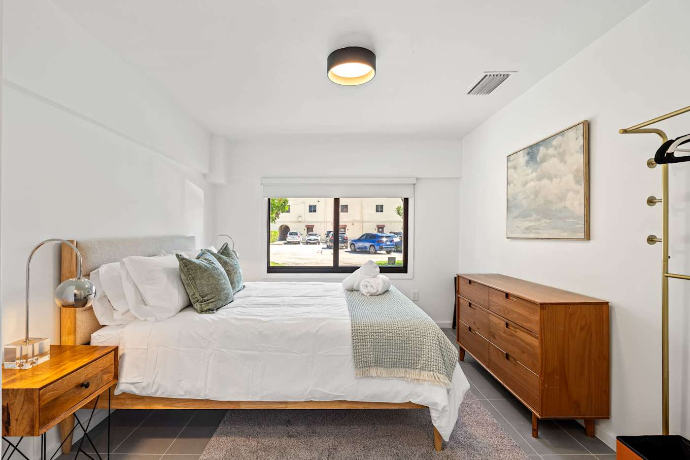 Mangrove Manor: Queen bedroom with dresser, wardrobe and street facing window