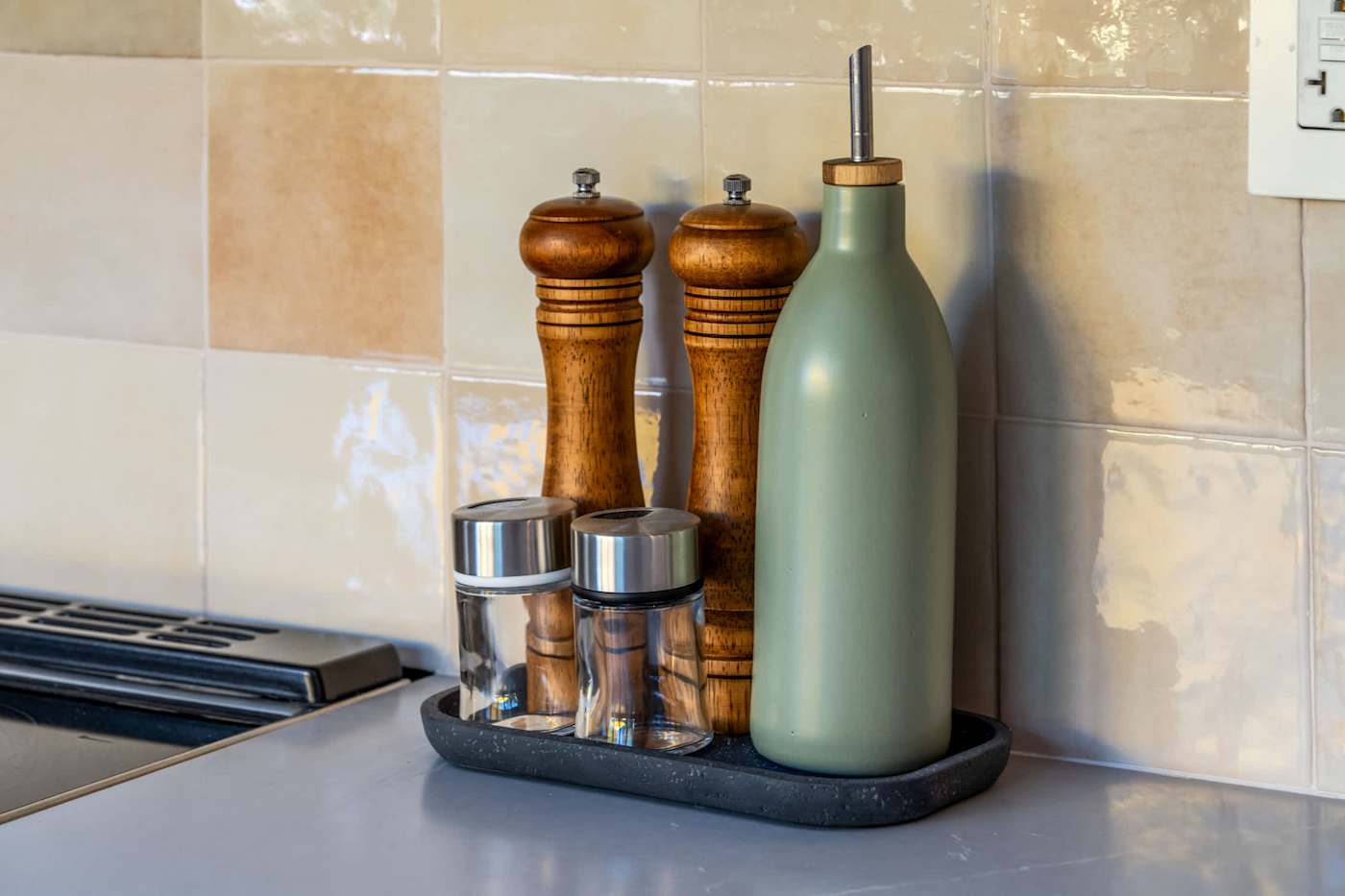 Mangrove Manor: Salt, pepper and oil left stocked by the hob