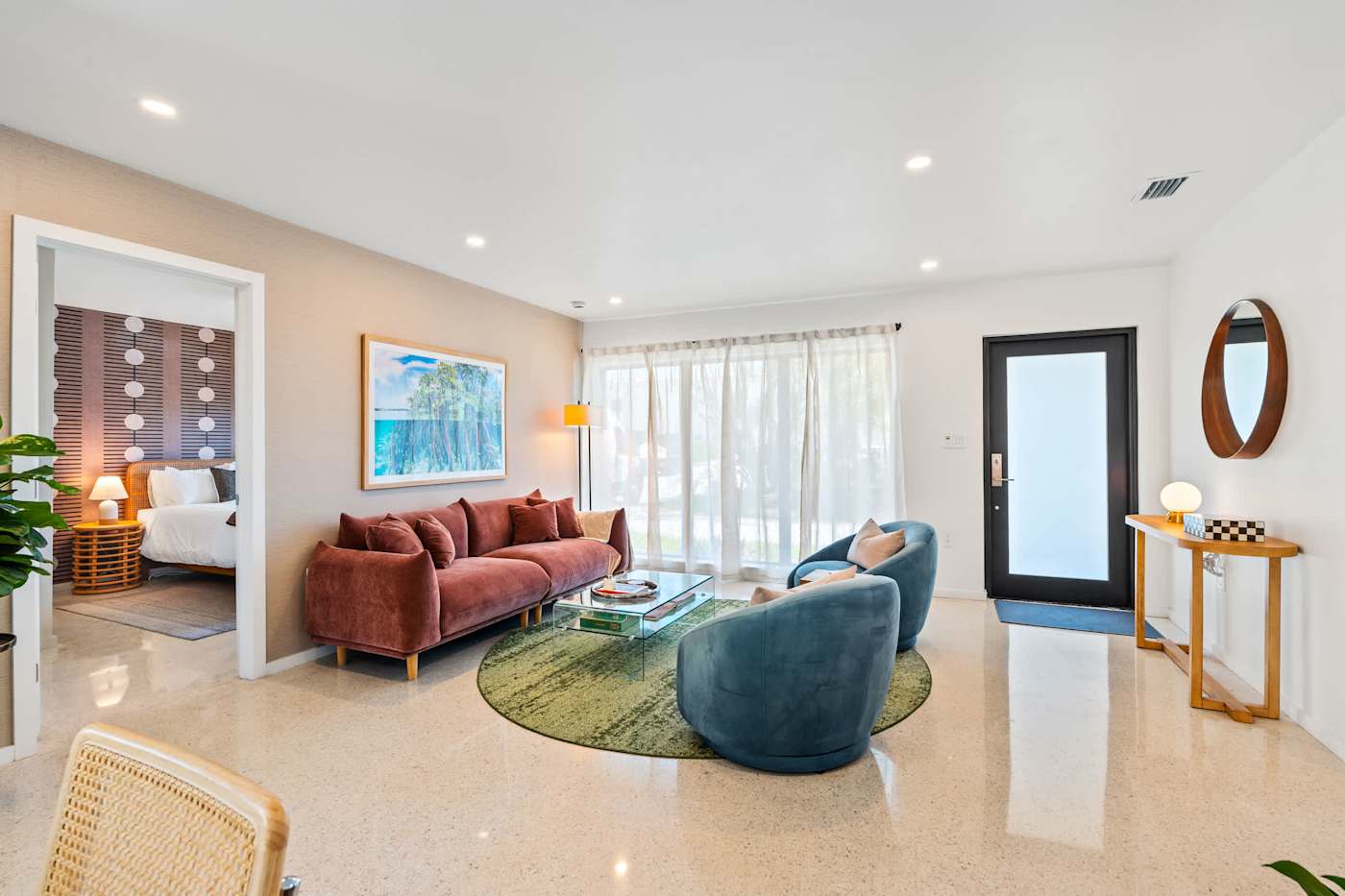 Mangrove Manor: Living room looking through to a bedroom and the front entrance