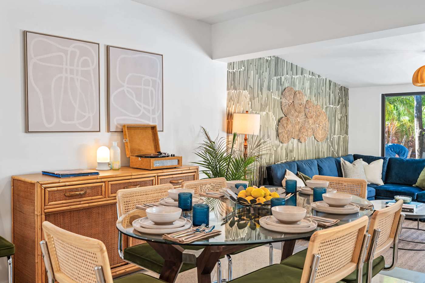 Mangrove Manor: Dining table set for six, with the record player behind