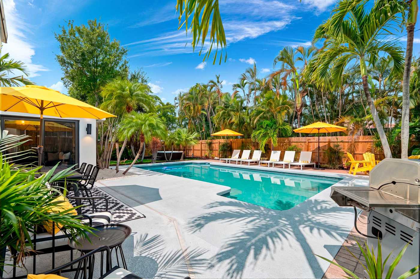 Mangrove Manor: Pool deck with the grill and bar seating