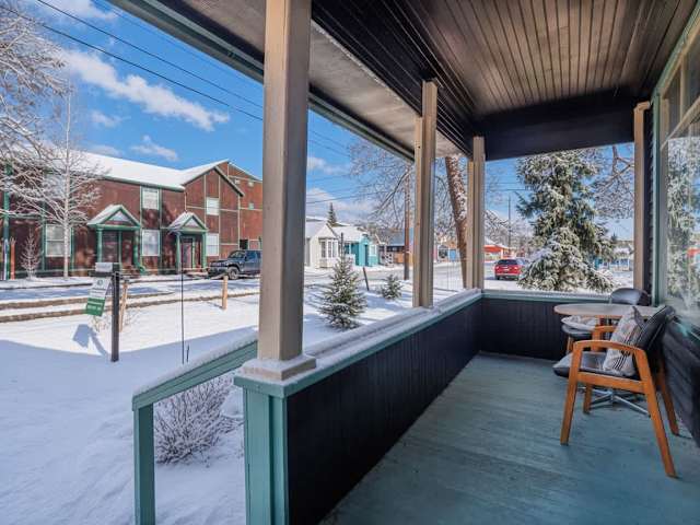 【Front Porch】 Covered porch seating — coffee in the morning, drinks in the evening