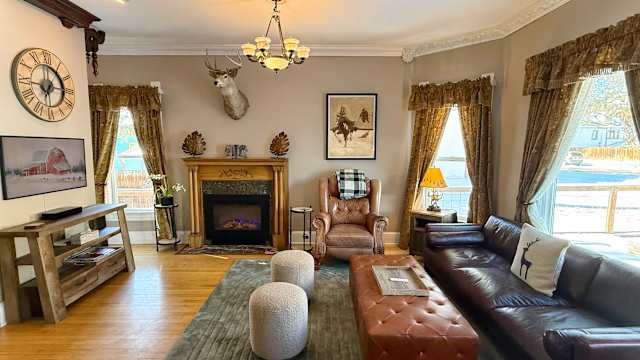 【Main Living Room】Original 1893 fireplace — the whole-crew gathering spot