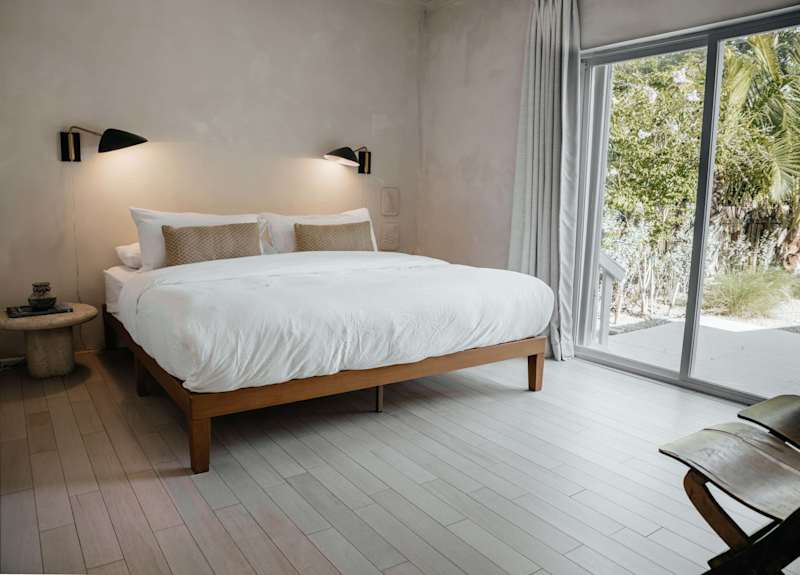 Sol y Sombra: King sized mattress inside one of the bedrooms filled with plenty of natural light