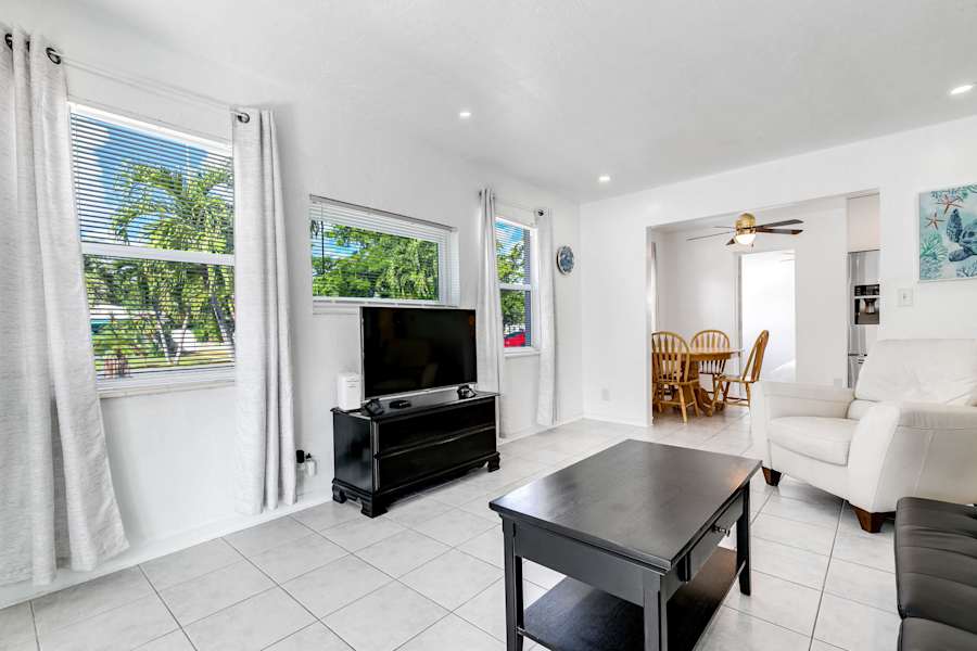 Pompano Bungalow: Glass windows throughout the house provide plenty of natural light