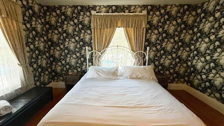 【Bedroom 1】Second look — Smart TV and blackout-friendly drapes