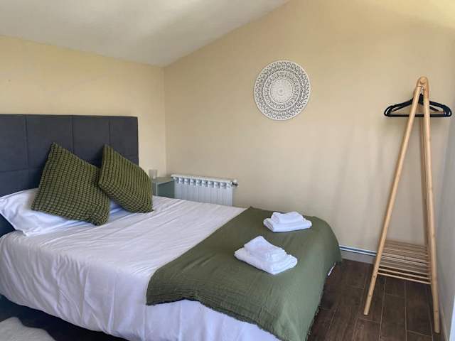 Dormitorio 1 con cama de matrimonio