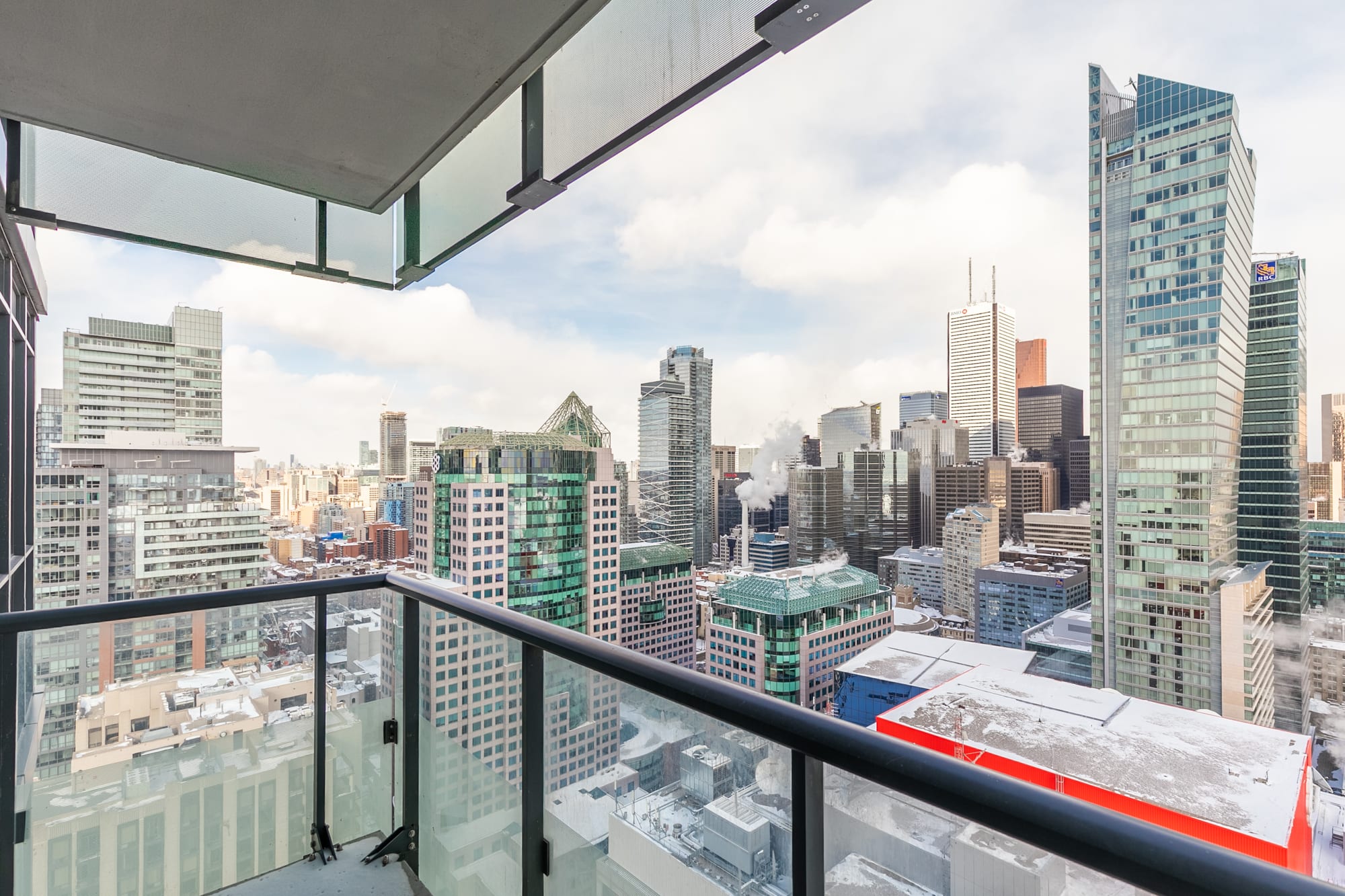 The balcony offers a stunning view of Toronto.