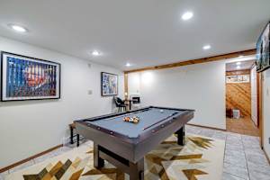 Game Room: Enjoy a lively game of pool with friends in this art-filled space—perfect for entertainment and relaxation during your stay!