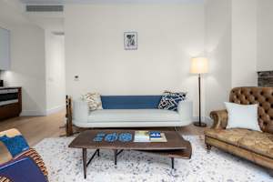 Photo #6 of Library Loft | Modern 2BR Condo with Private Terrace & Gym