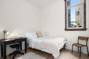 Photo #11 of Library Loft | Modern 2BR Condo with Private Terrace & Gym