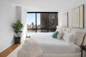 Photo #6 of Sutton Heights | 20th-floor 2BR w/Doorman, Gym, and Pool Photo #6 of Sutton Heights | 20th-floor 2BR w/Doorman, Gym, and Pool